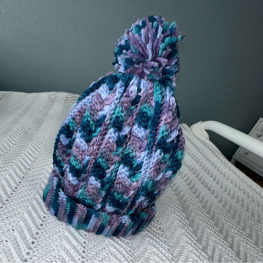 Beautiful multicolored hand crocheted hat with pom pom